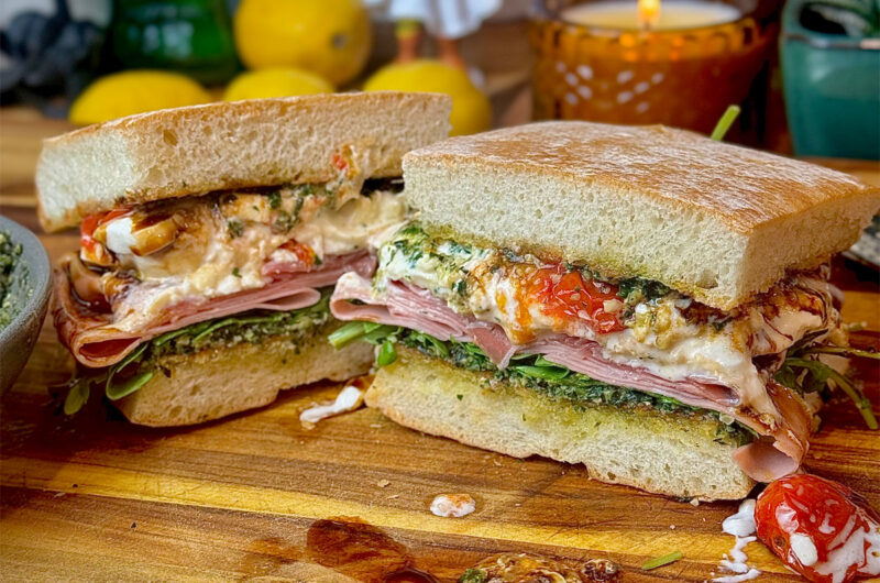Burrata Caprese Sandwich with Hand-Chopped Pesto, Mortadella, and Prosciutto